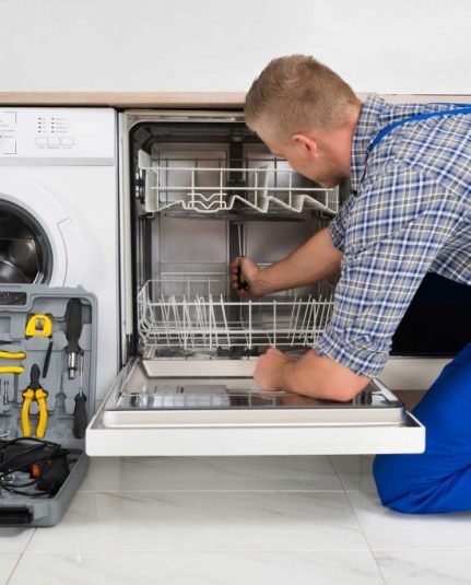 technician fixing a dishwasher repair Pittsburgh