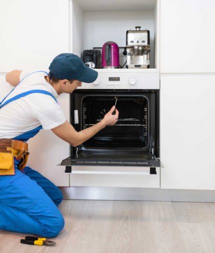 man repairing oven - About Next Door Appliance Repair Pittsburgh - Oven Repair Pittsburgh