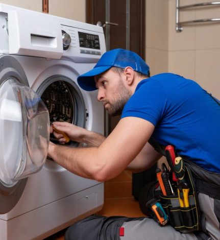 a technician repairing a washer and dryer repair Pittsburgh